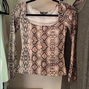 Snake pattern top. Never worn,